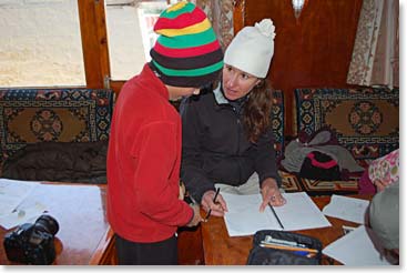 Khobe takes a pause during his studies at the Panaroma lodge in Namche.