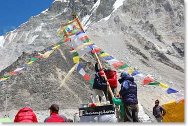 The flag goes up!  Near the end of the pooja ceremony our prayer flag pole is raised over our chorten.  The chorten will stand as the center of our base camp throughout the expedition.