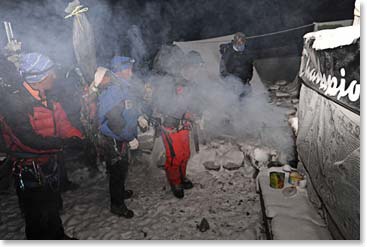 Sherpas always start their climbs with a few moments spent at the chorten.  A sacred juniper fire is lit and will burn while they are away.