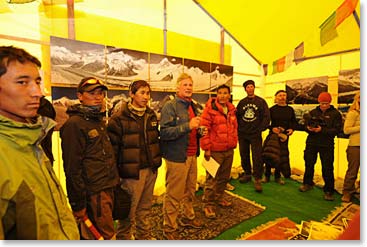 As we entered the massive tent, David and his team greeted us, with the prints they had hung carefully around the walls of the tent, ready to be viewed.