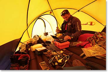 In our tent at Camp I Jamie is intent on technical issues. Sat phones, computers, and cables are a part of our life here in the Western Cwm.