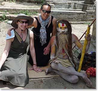 Maya and Kerri pose with a holy man