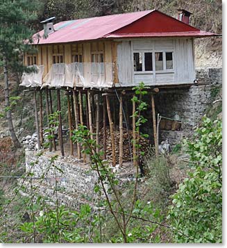 A house along the trail being held up by bamboo---don't worry, this is not our lodge!