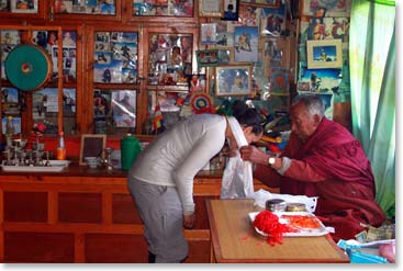 Maya being blessed by Lama Geshe