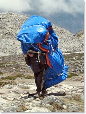 Watching the porters on the trail makes us feel very humble.