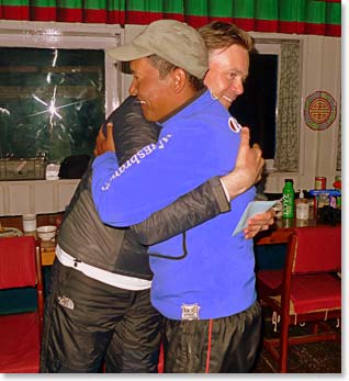Mingma and Jeremy share a heartfelt hug.