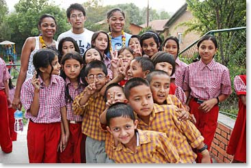 A group of school kids makes their new friends feel welcome.