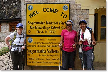 Theresa, LaShonda, and LaQuishia posing at the entrance to Sagarmatha National Park