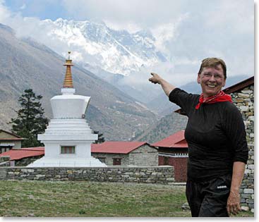 Brenda stands with our first good view of Everest in the background.