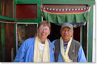Brenda and James outside Lama Geshe's home after receiving their blessings.