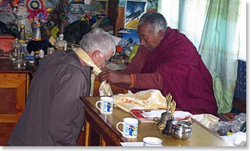 Doug is happy to be blessed for the second time by Lama Geshe. His first time was on his last trip in 2006.