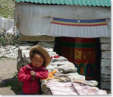 Sherpa child outside her home