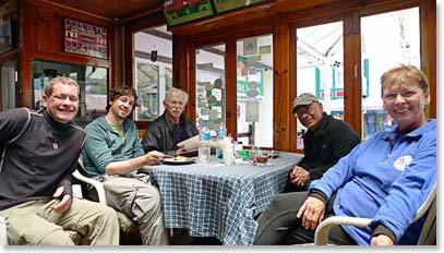 The team gathers for lunch at a bakery in Namche.