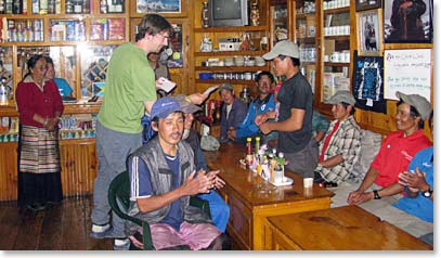 Andrew shares tip money.