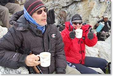 Wes and Allison keeping warm with a cup of tea