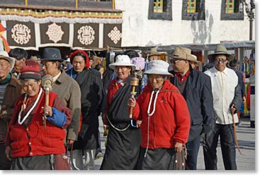 People in the bustling Jokhang Square