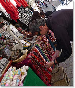 Heiko looking at the necklaces