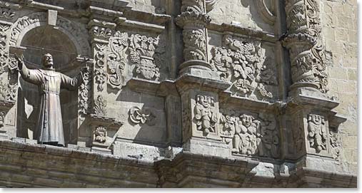 The Saint and Pachamama on the front of the church