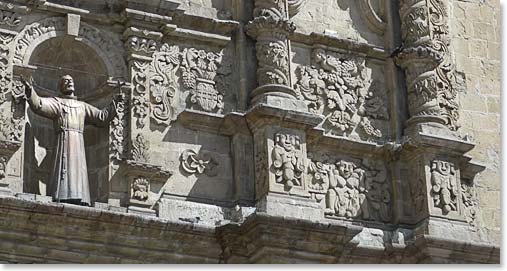 The Saint and Pachamama on the front of the church