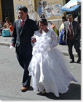 The bride and groom arrive at the church.