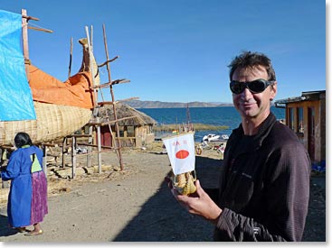 Heiko with his miniature copy of a reed boat