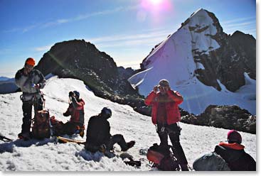 Taking a break near the summit of Tarija with Pequeno Alpamayo in the background