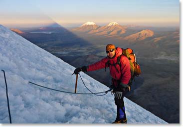 Heiko with the sun rising on summit day