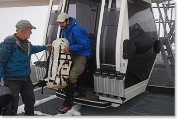 Tom and Mo step out into the mist at the top of the second gondola.