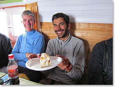 Mo was in heaven after his 5th seven summit ascent:  a coca cola and a piece of summit cake