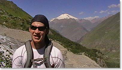 Scott with a great view of Elbrus behind