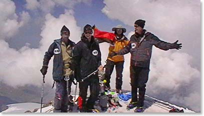 The team celebrates on top of Elbrus.