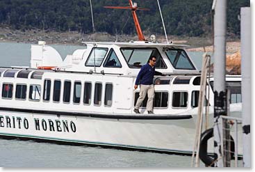 The boat arriving at the dock.