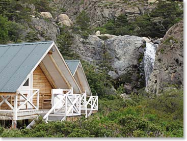 The cabins are right next to a natural waterfall