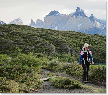 Sharon hiking with Cuernos behind