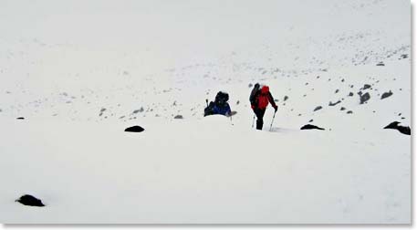 Climbing through deep, snowy conditions