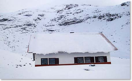 The high hut covered in snow