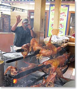 On the drive back to Quito, Guiena Pigs roasting for lunch