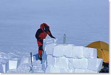 Ice and snow block walls for sheltering our tents from the wind