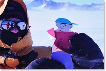 In our final hours in Antarctica, buffeted by the wind and proudly wearing his new