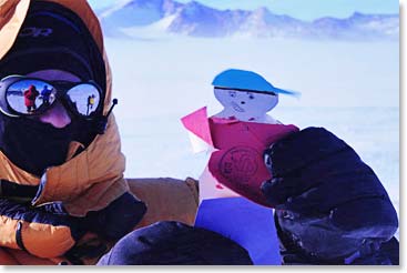 In our final hours in Antarctica, buffeted by the wind and proudly wearing his new 