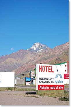 Hotel Ayelen and the arid slopes under blue skies