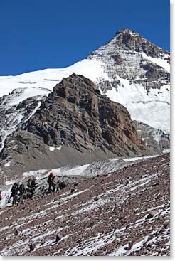 Climbing higher up the mountain under crystal blue skies