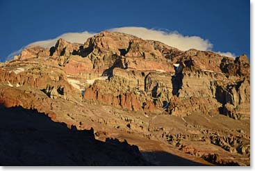 Aconcagua shrouded by a lenticular cloud.  This cloud cap indicates an entirely different situation—high winds and deteriorating conditions.