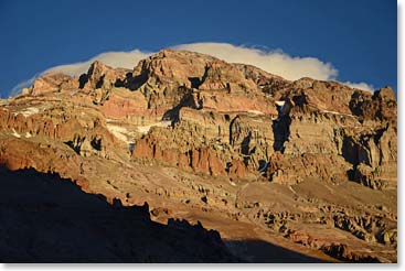 Aconcagua shrouded by a lenticular cloud. This cloud cap indicates an entirely different situation—high winds and deteriorating conditions.