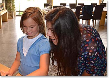 Andrea’s daughter, Mili, and Mariela proudly looked on.