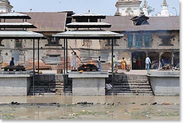 Pasupatinath is located along the Bagmati River which flows to the Holy Ganges. We were fascinated watching cremations taking place there.