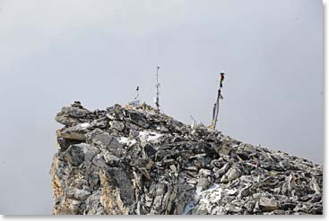 The top of Kala Patar is cold and barren except for the weather station and prayer flags.