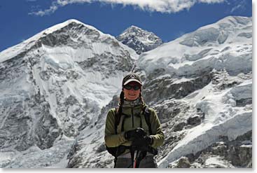 Along the way to Base Camp, Sara with Mount Everest above.