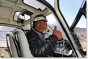 Pemba, our friend the helicopter pilot, gave Charles a ride back to Kathmandu. His spirits were high, but his back was not up for the walk down.