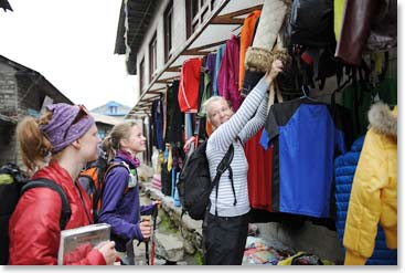 Sara, Mathes and Jackie were still shopping as they walked down the long street in Lukla that leads to the airstrip.